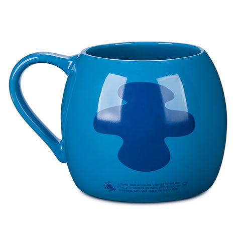 Disney Store Stitch mug lifestyle setting on table conveying large-capacity beverage enjoyment