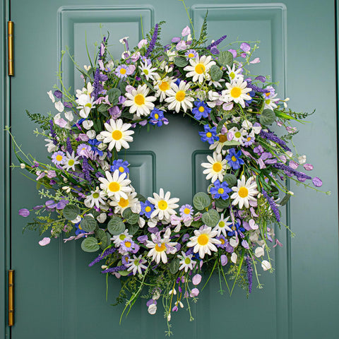 DIYFLORU wreath next to door frame illustrating 22-inch scale