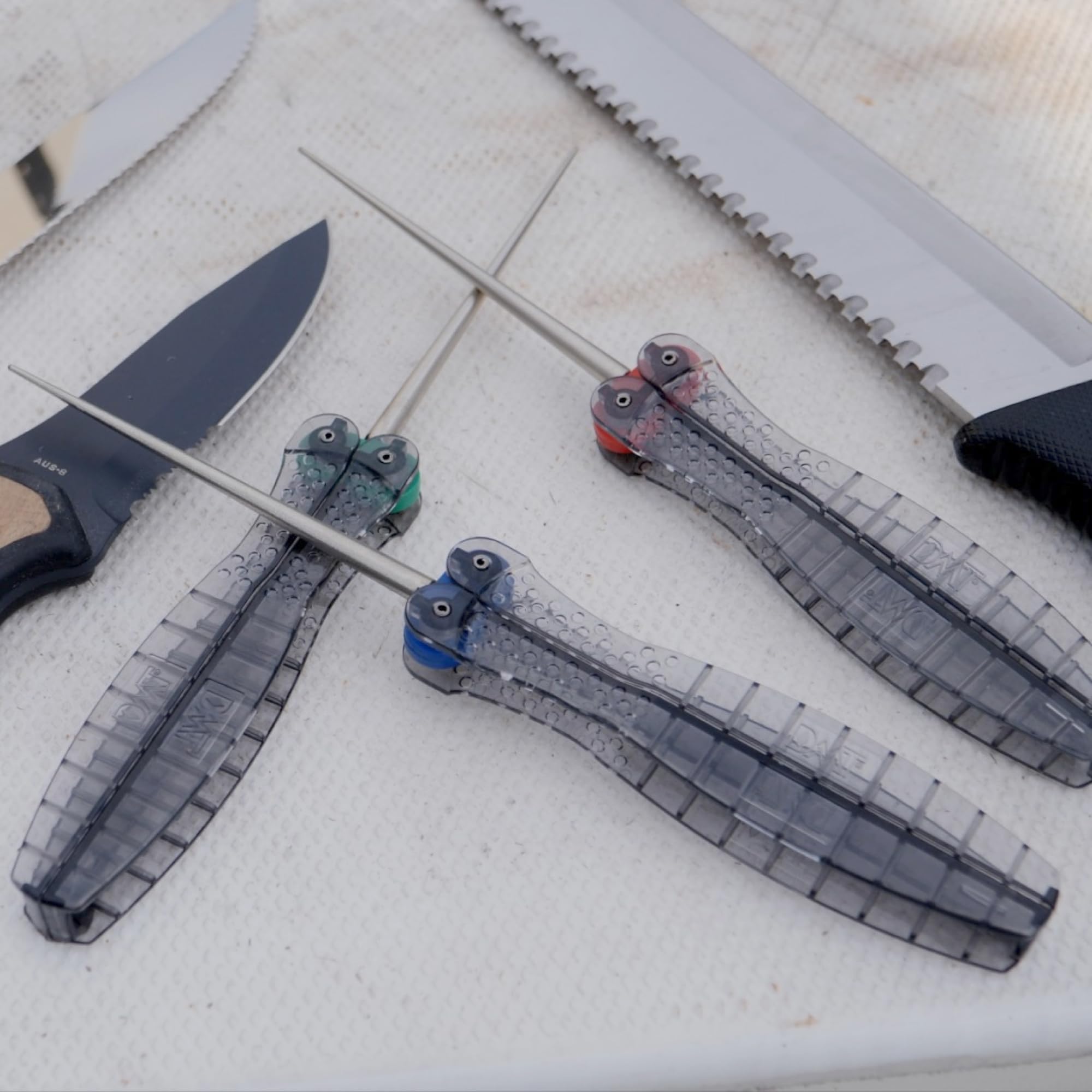 DMT Diafold beside kitchen knife to show scale and portable usefulness