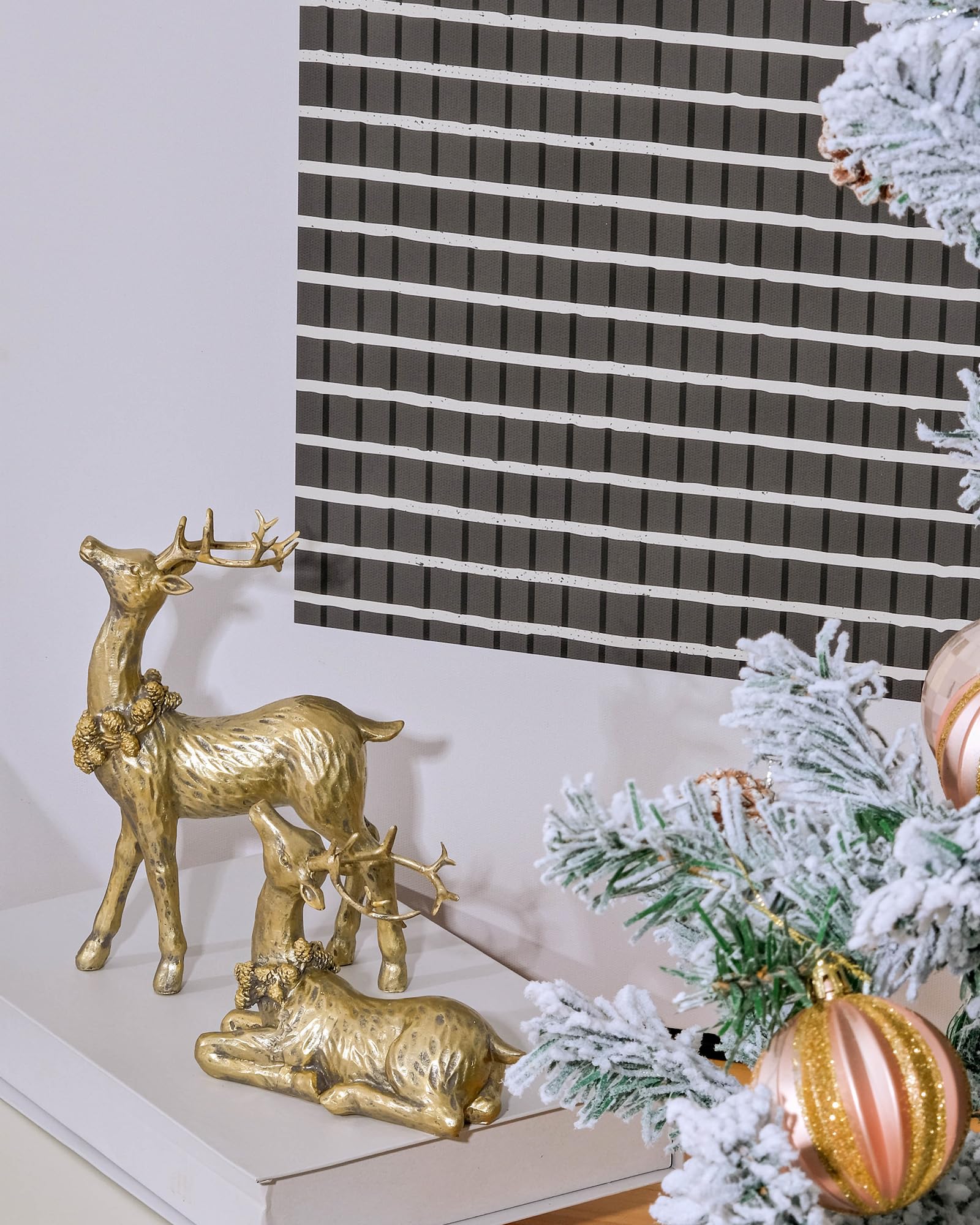 DN DECONATION pine cone wreath detail around reindeer neck showing festive accent