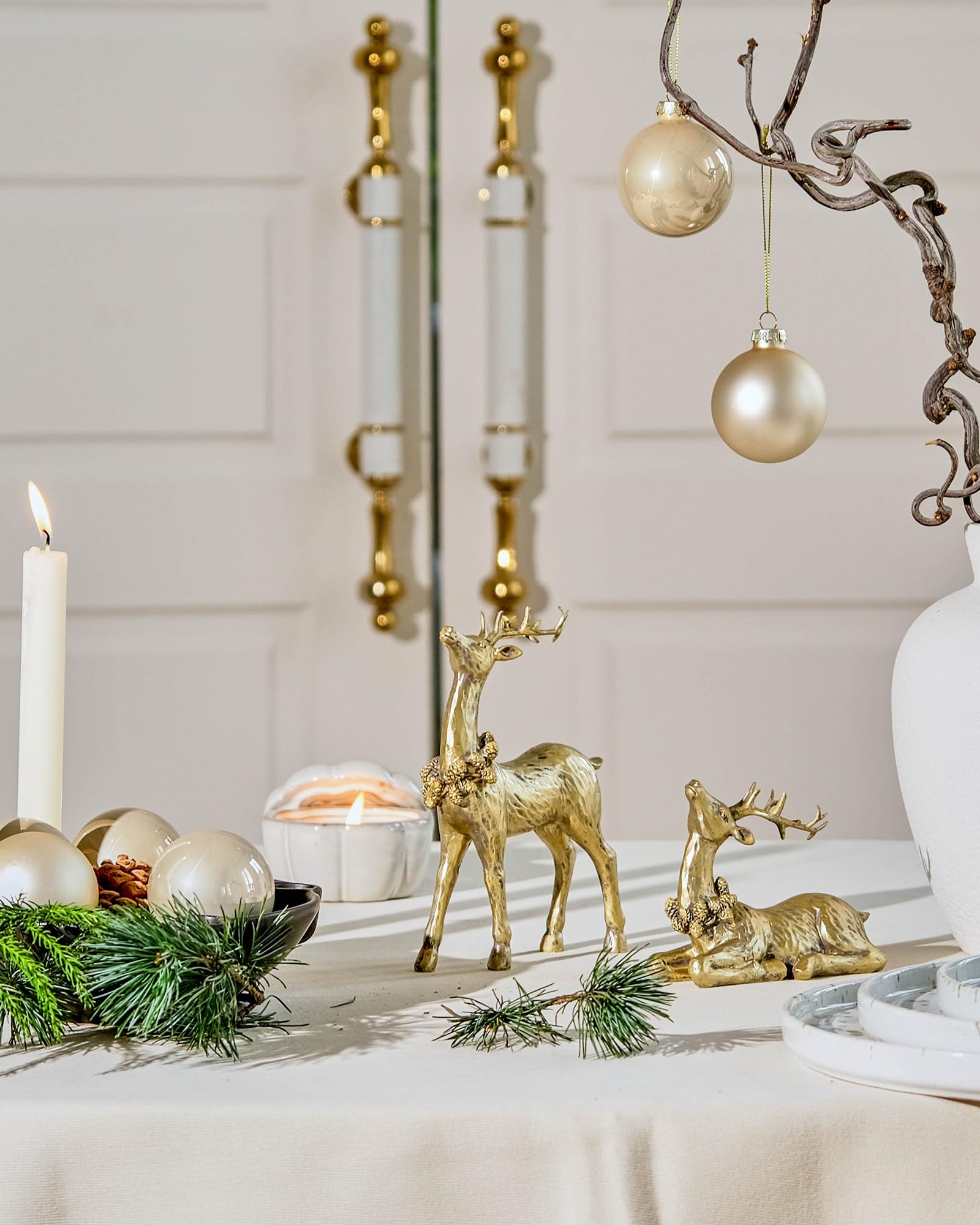DN DECONATION reindeer pair beside a ruler for scale and placement planning