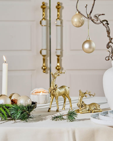 DN DECONATION reindeer pair beside a ruler for scale and placement planning