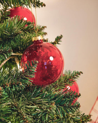 DN DECONATION ornaments hanging on a decorated tree for instant festive transformation