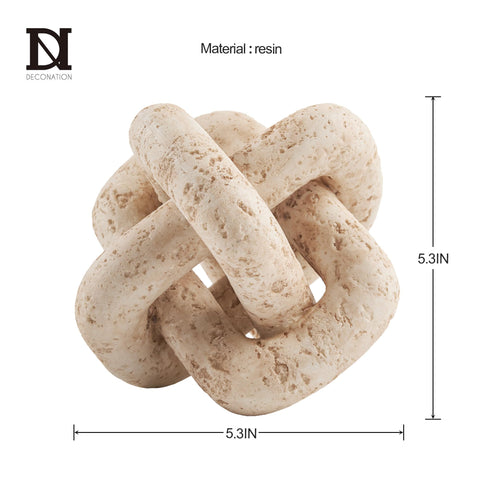 DN DECONATION knot on coffee table adding sculptural interest and layered styling benefit