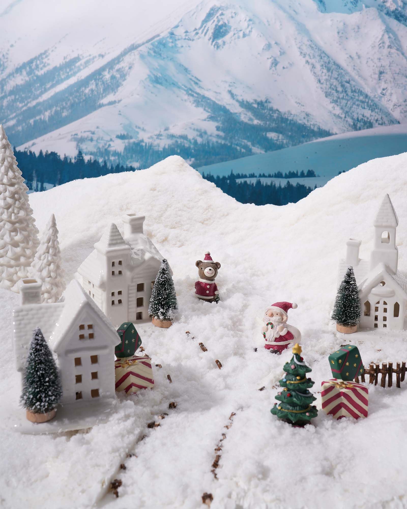 DN DECONATION village arranged on mantel, enhances festive mantel display