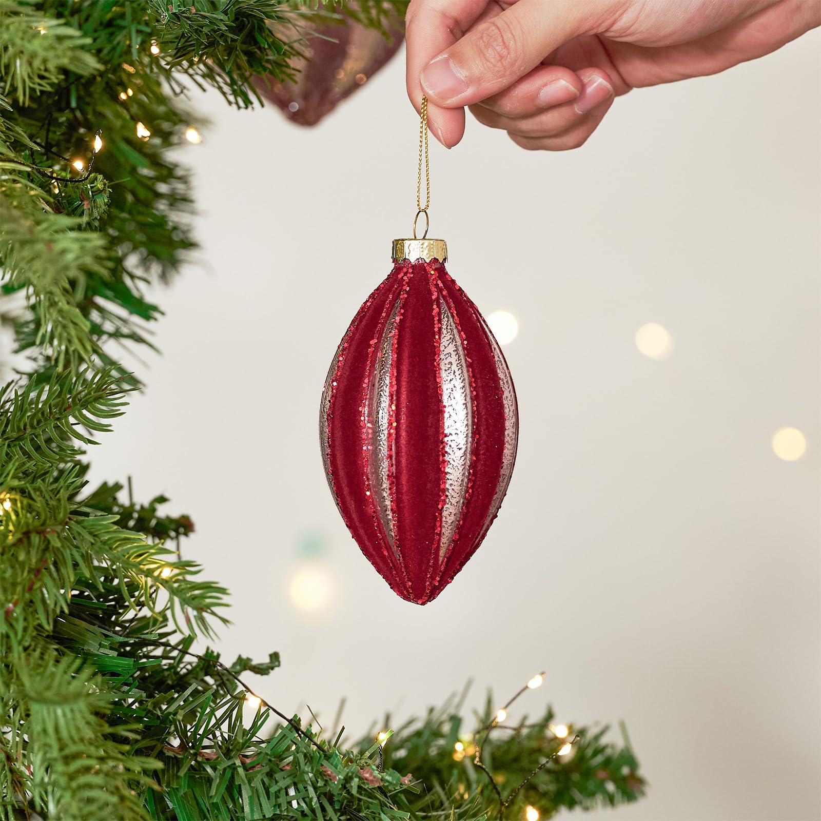 DN DECONATION ornaments held in hands for scale, ideal for varied displays