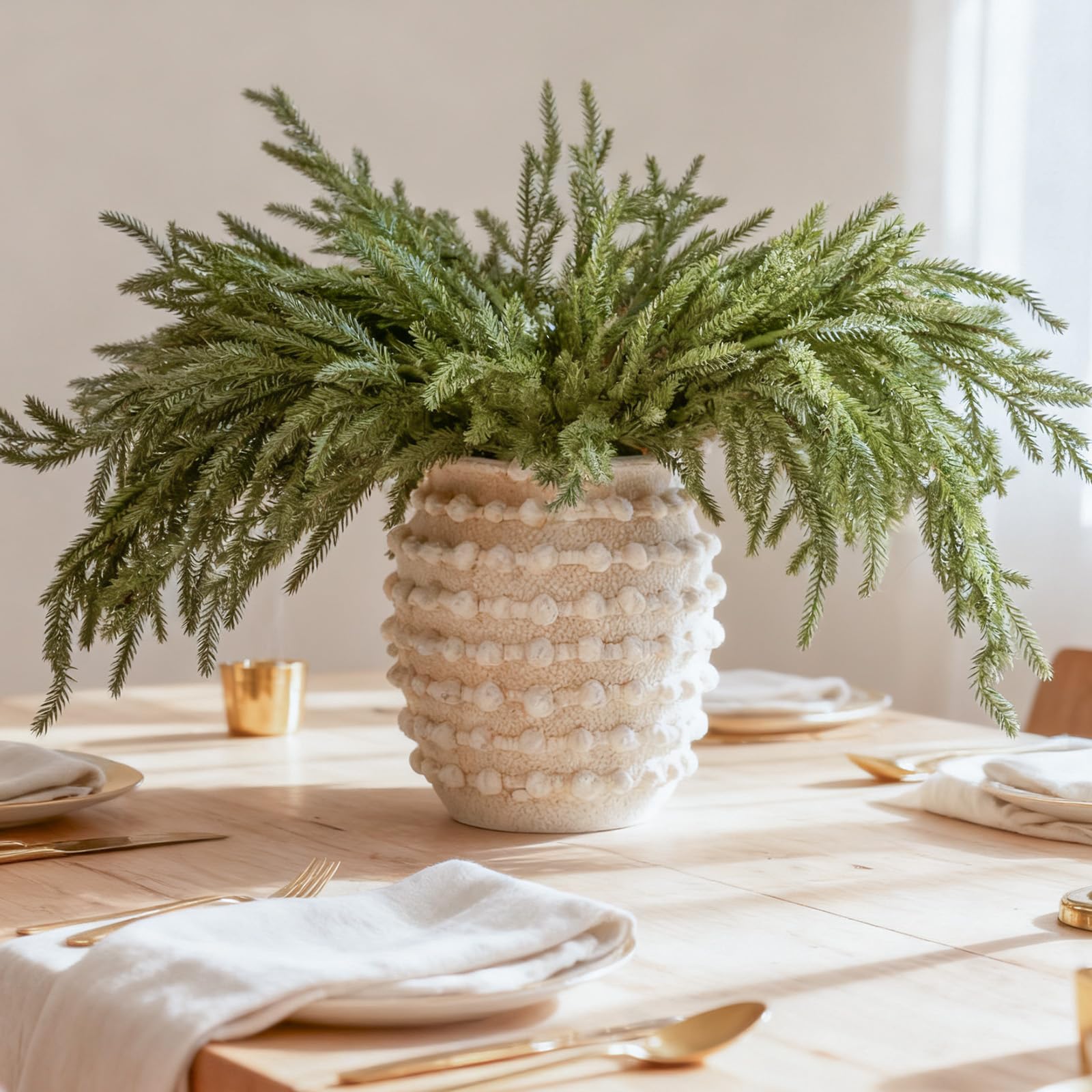 DN DECONATION styled in a vase as a holiday centerpiece adding full green volume
