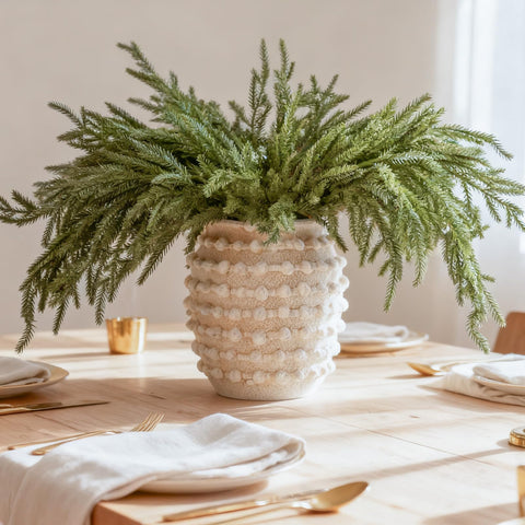 DN DECONATION styled in a vase as a holiday centerpiece adding full green volume