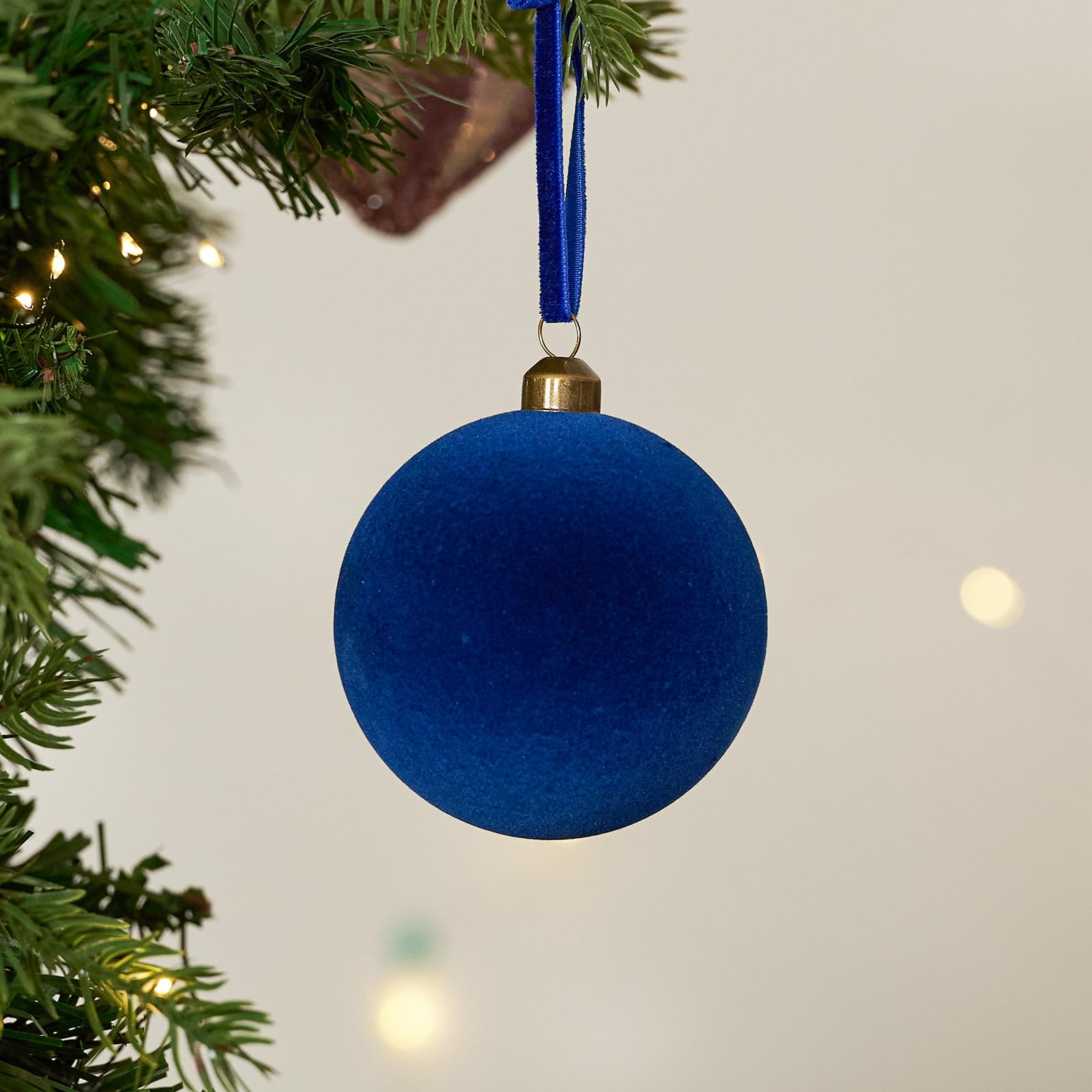 DN DECONATION ornaments arranged as a table centerpiece for festive decor