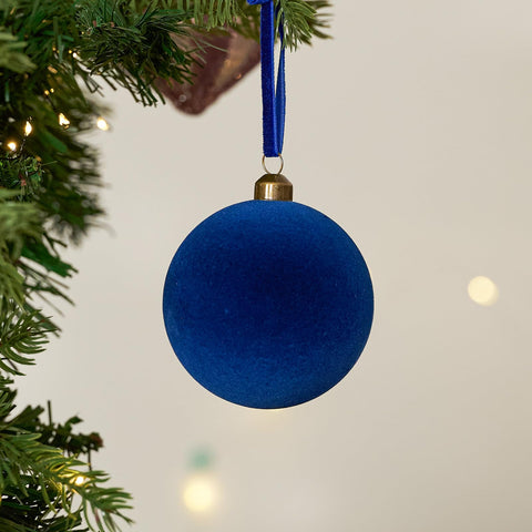DN DECONATION ornaments arranged as a table centerpiece for festive decor