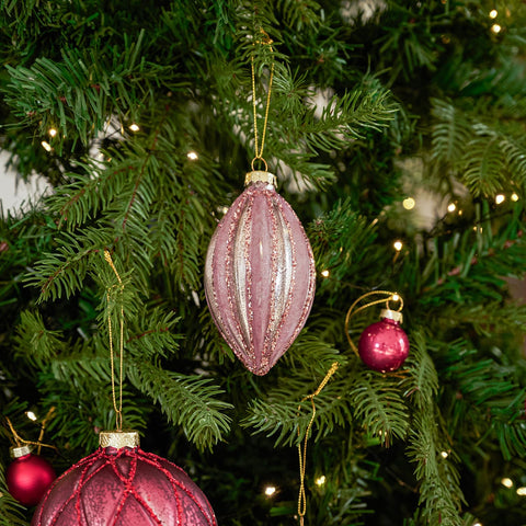 DN DECONATION ornaments styled on wreath and table for cohesive holiday decor
