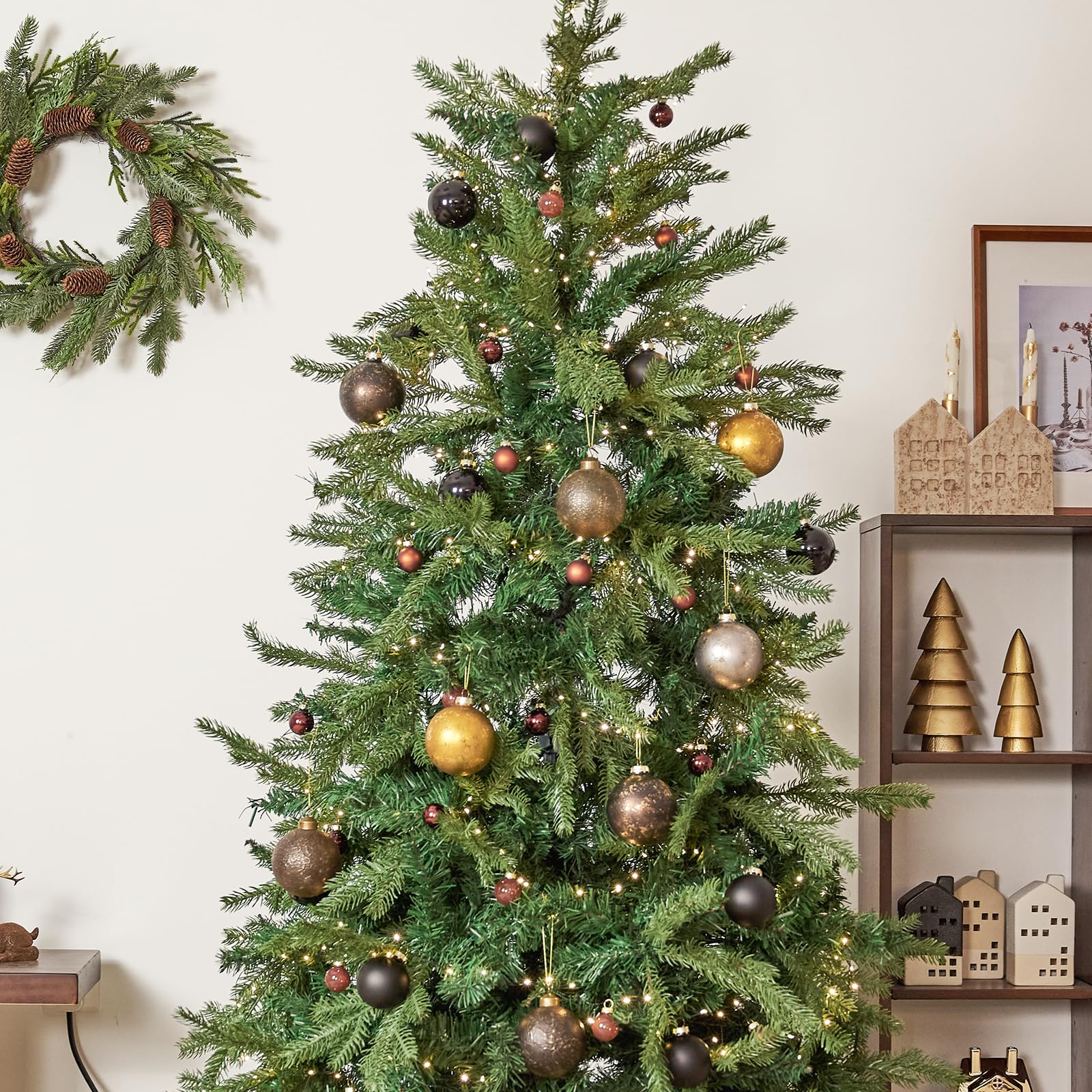 DN DECONATION ornament nestled in wreath showing how it complements natural greens