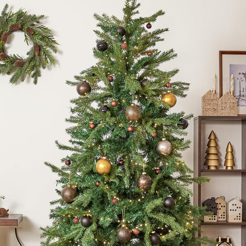 DN DECONATION ornament nestled in wreath showing how it complements natural greens