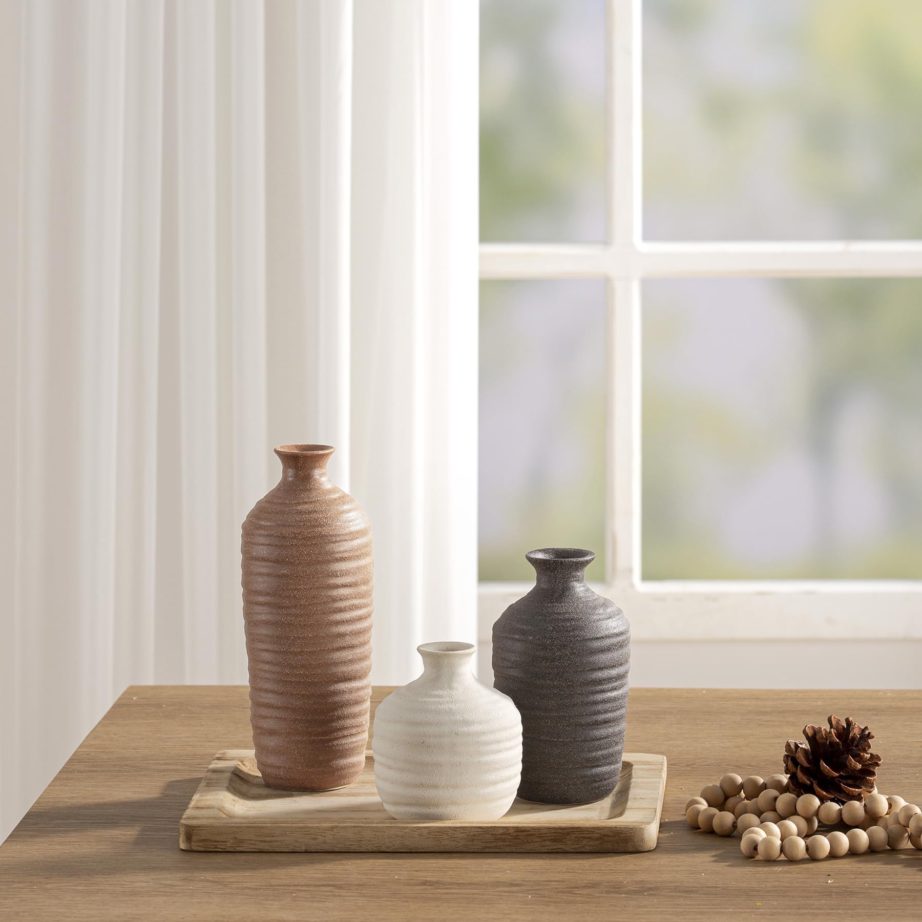 Dobbyby short vase on shelf for scale and compact accent placement