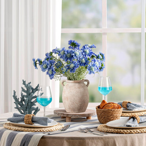 Dobbyby on a mantel with decor showing cohesive tabletop styling