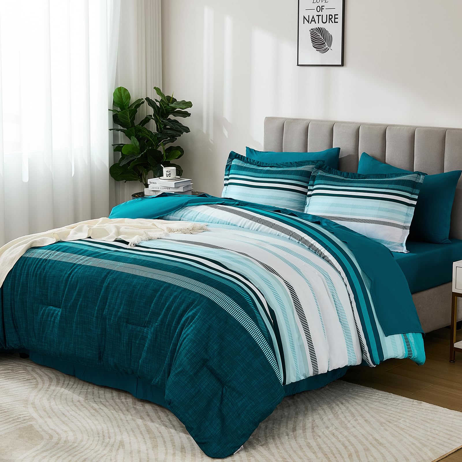 Dobuyly stripe pattern detail highlights teal and blue tones that modernize bedroom style
