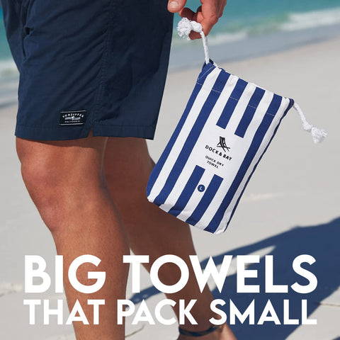 Dock & Bay Cabana hanging on umbrella showing quick air-drying convenience