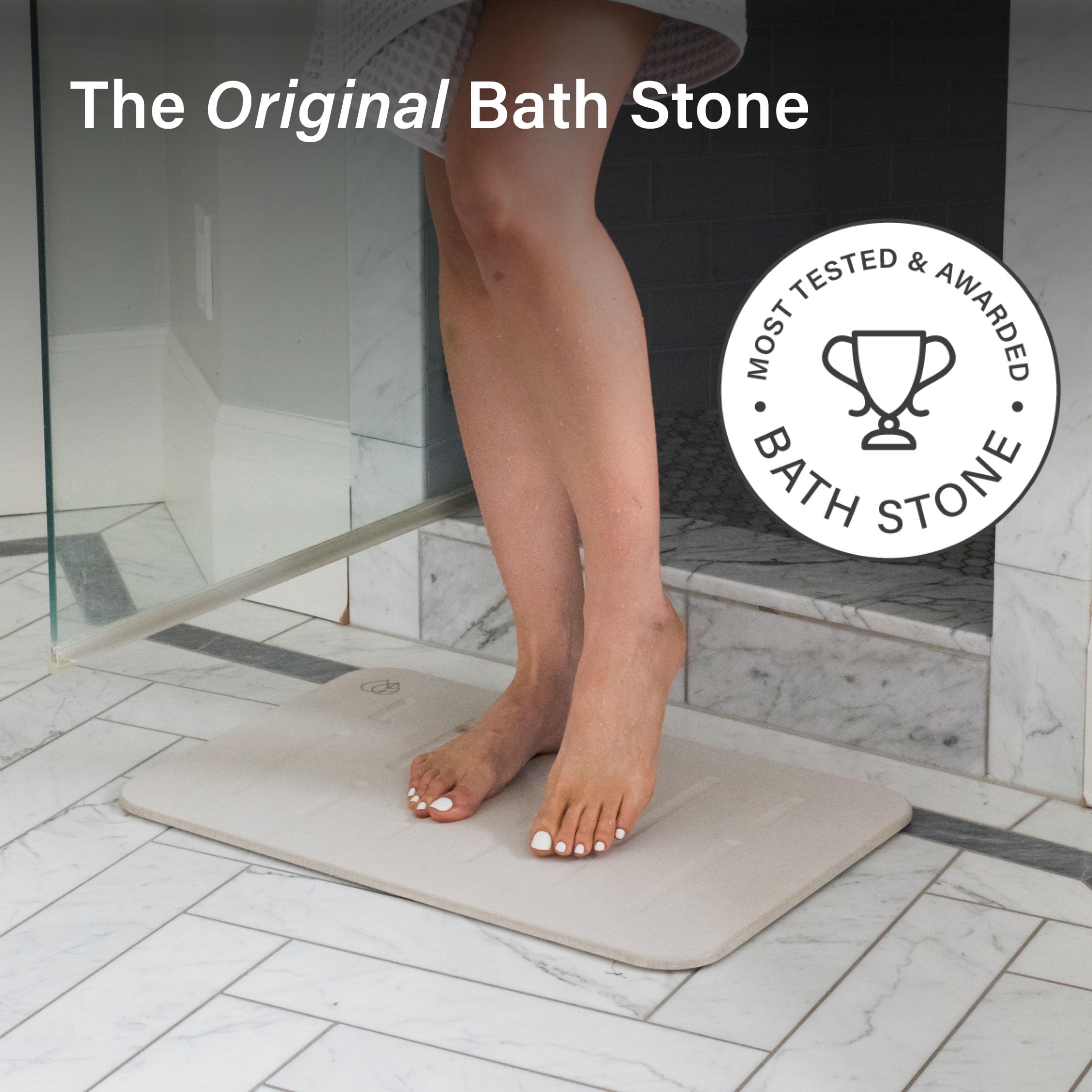 Dorai mat absorbing water from shower to demonstrate quick dry advantage