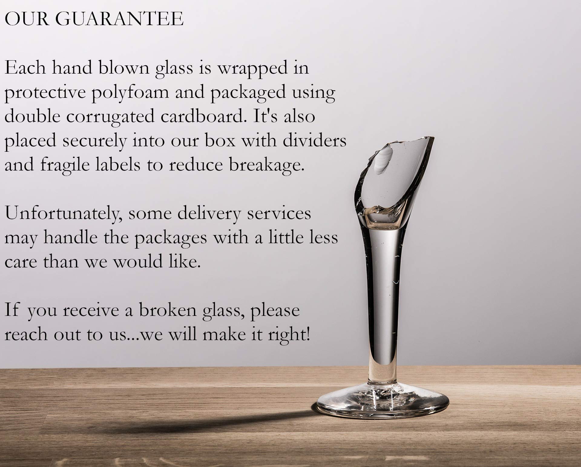 Dos Sueños glass beside a hand for scale demonstrating comfortable size and hold