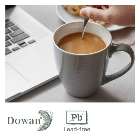 DOWAN mug with coffee in use illustrating generous 17 oz serving