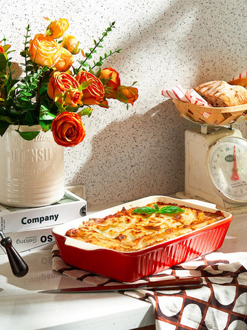 DOWAN red casserole on dining table presented for serving, enhancing meal aesthetics