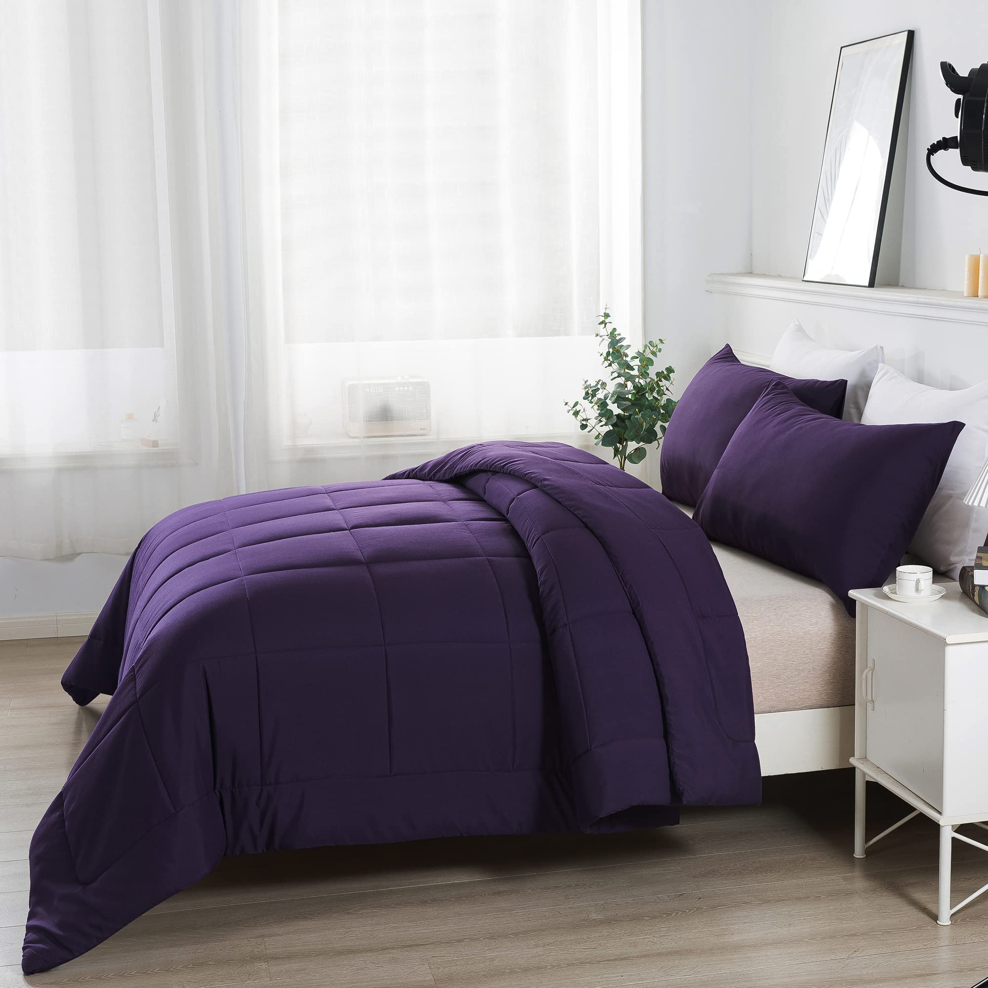 DOWNCOOL unpacked comforter freshly fluffed showing quick setup and restored loft benefit