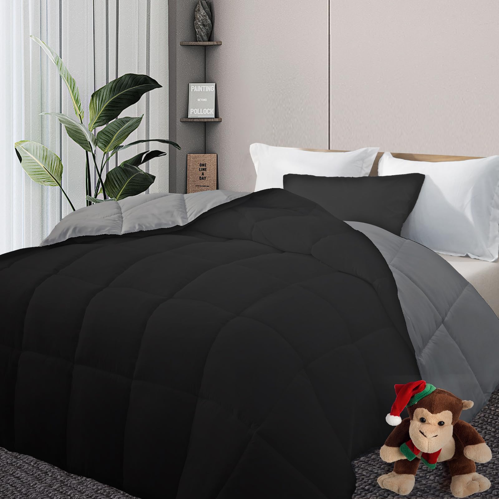DOWNCOOL front view showing reversible black and grey comforter, modern bedroom benefit