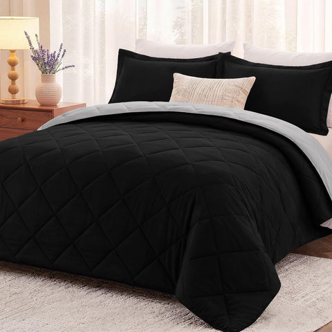 downluxe front view of comforter set showing black and grey reversible design and neat styling