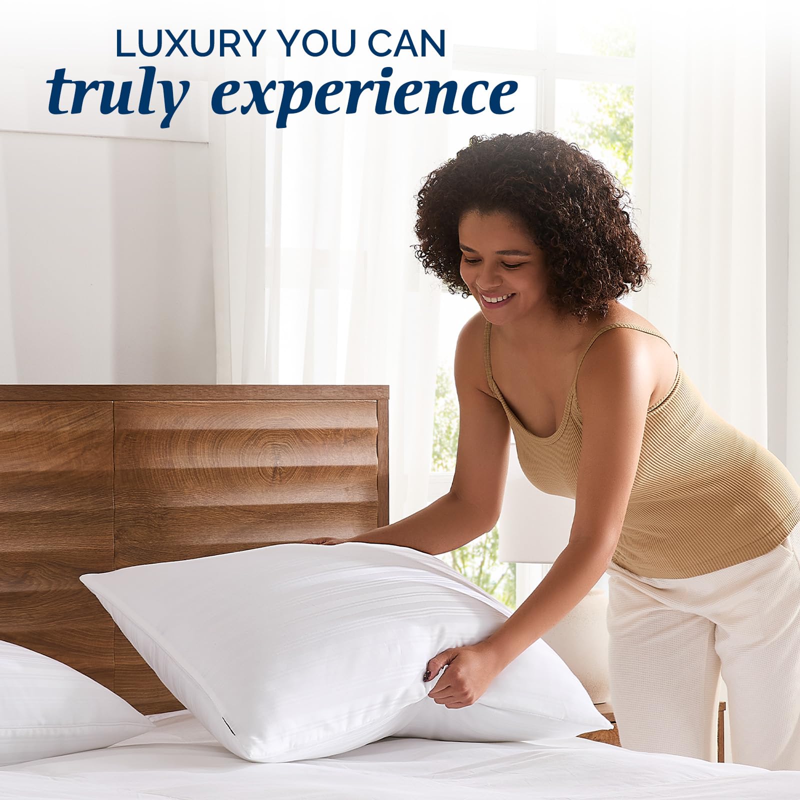 downluxe pillow styled on a made bed illustrating cozy bedroom benefit