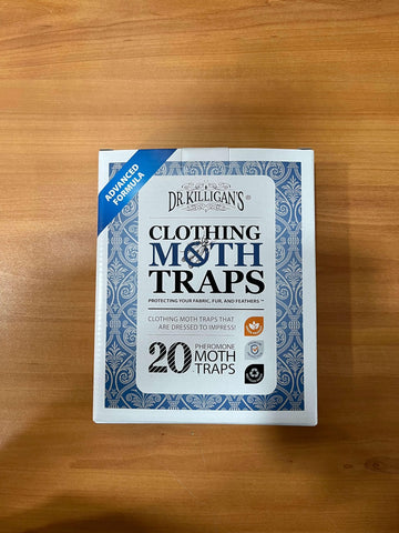 Dr. Killigan's trap beside a coin showing compact size and easy placement
