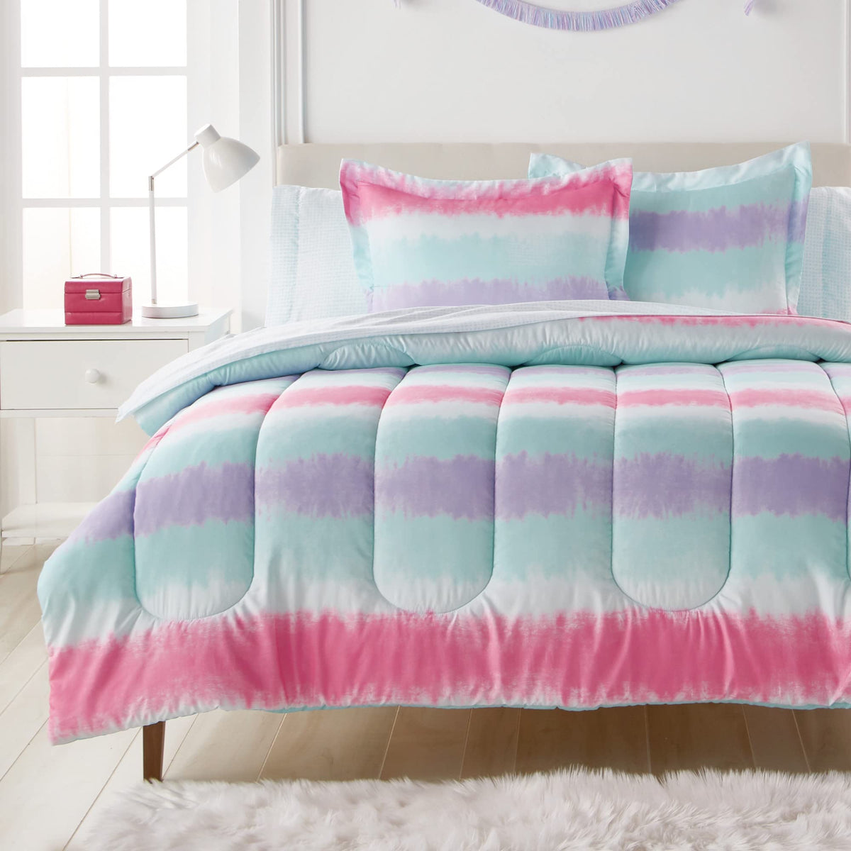 dream FACTORY comforter front view showing colorful tie dye stripes and playful pattern benefits visual appeal