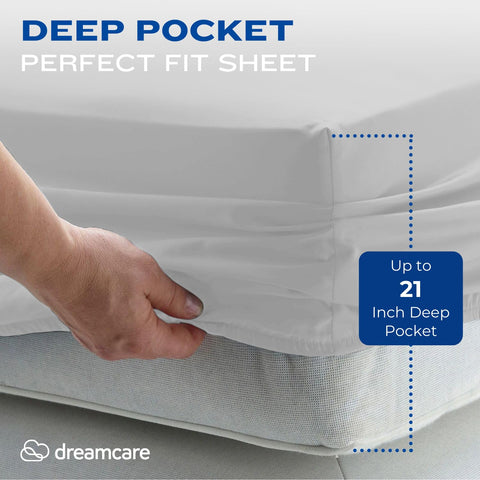 DREAMCARE fitted sheet corner close-up showing elastic and snug fit benefit