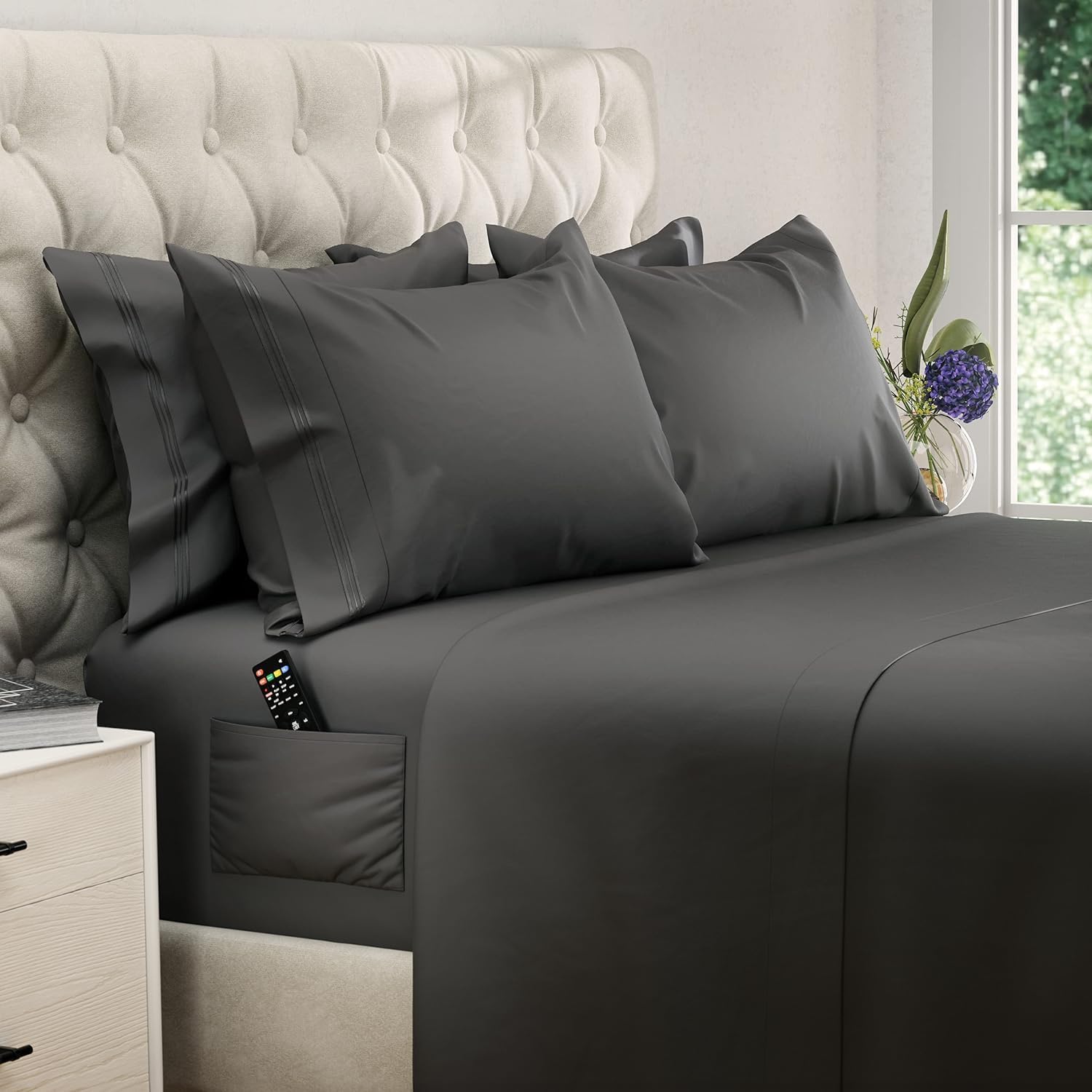 DREAMCARE fitted sheet on mattress showing 15-inch fit benefit