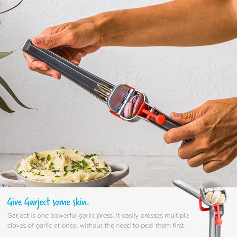 Dreamfarm Garject ejector button expelling peels for no-mess disposal benefit