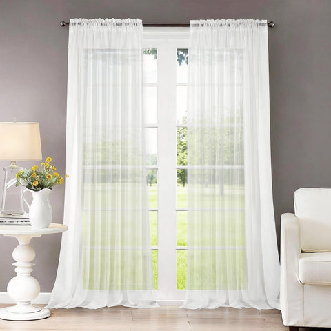 Dreaming Casa front view of two white voile curtain panels showing soft drape and packaging benefit