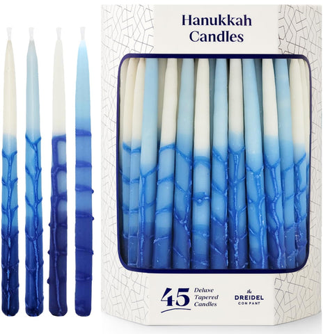 The Dreidel Company candles staged as a Chanukah gift with dreidel, highlighting presentable packaging