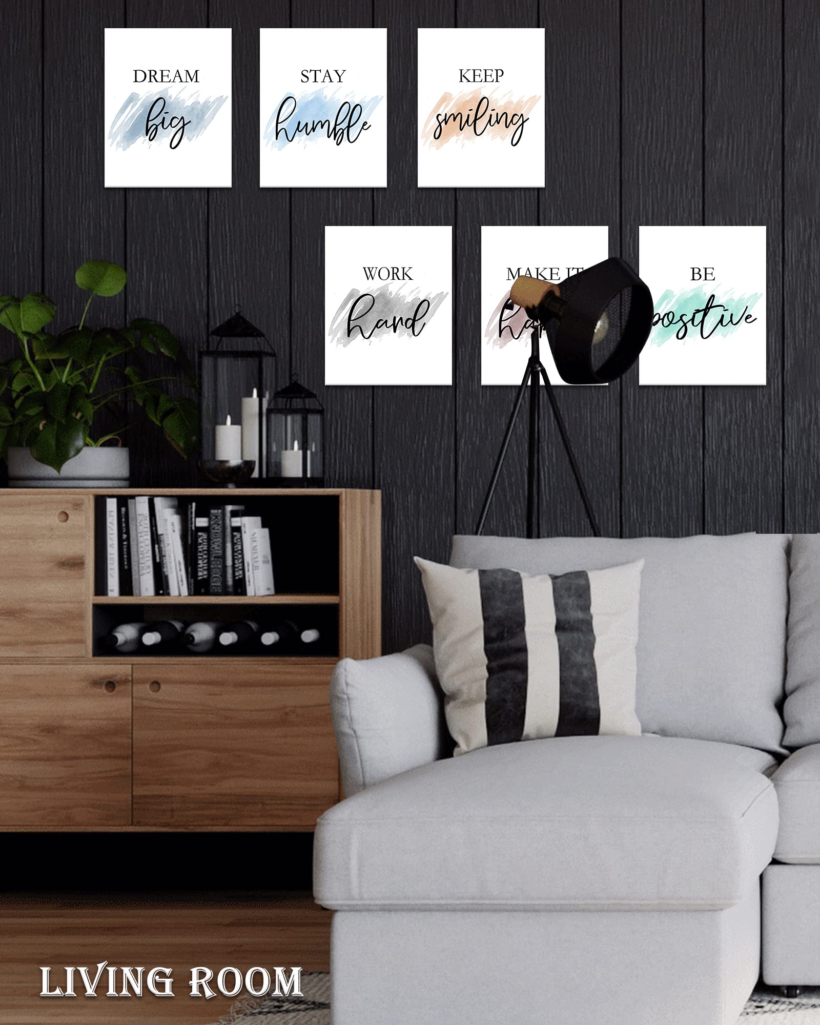 Drsoum canvases displayed above a home desk providing motivation and improving workspace focus
