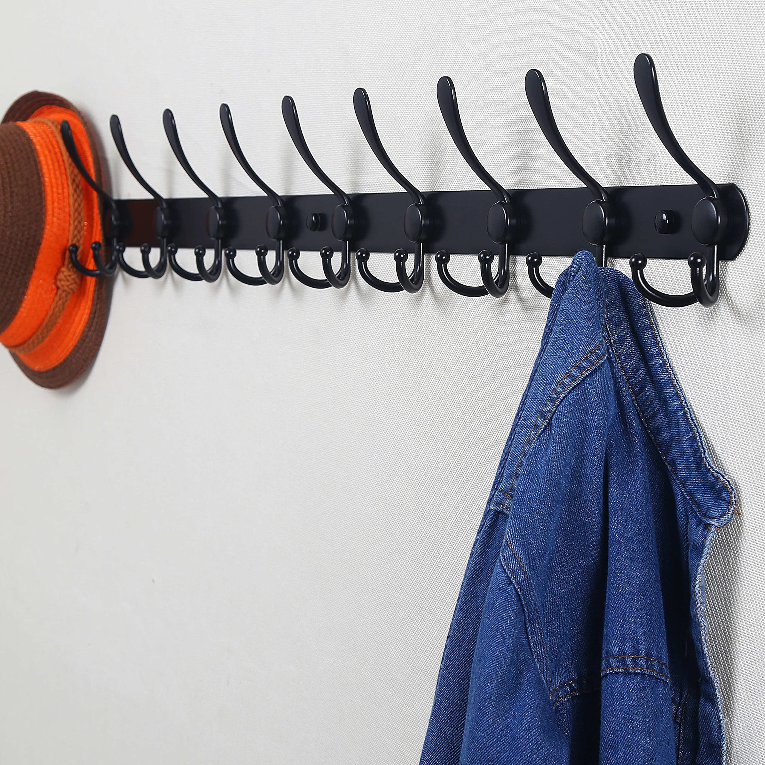 Dseap rail with a coat for scale, showing efficient use of wall space