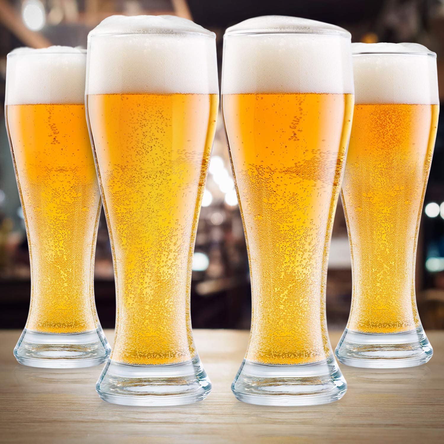 DU VINO hand holding hourglass pilsner glass showing comfortable grip and balance