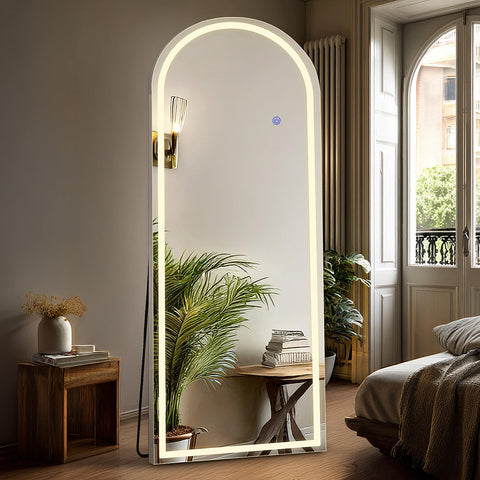 DUMOS arched mirror front view shows full-length reflection and stylish arched top benefit
