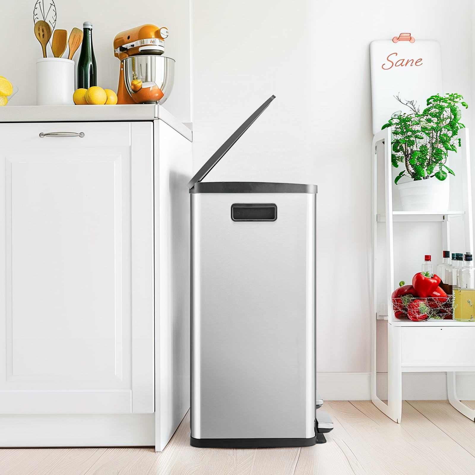 DUMOS trash can next to household items showing scale and room placement advantage