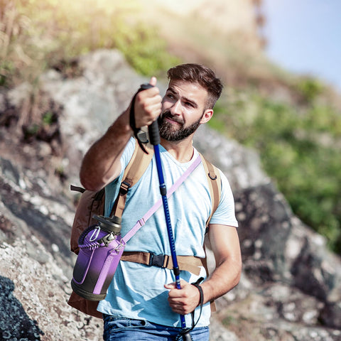 DYSANKY lifestyle shot of hiker drinking from bottle showing outdoor convenience