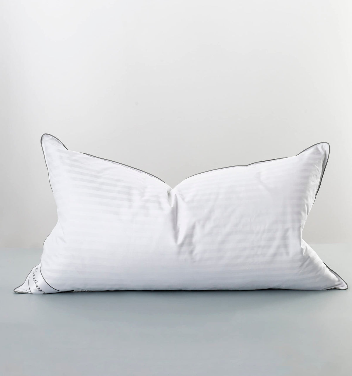Eastwarmth front view of king-size pillow showing stripe cover and neat finish benefits comfort
