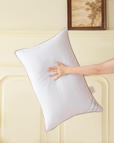 Eastwarmth king pillow next to ruler for scale showing true 20x36 inch sizing