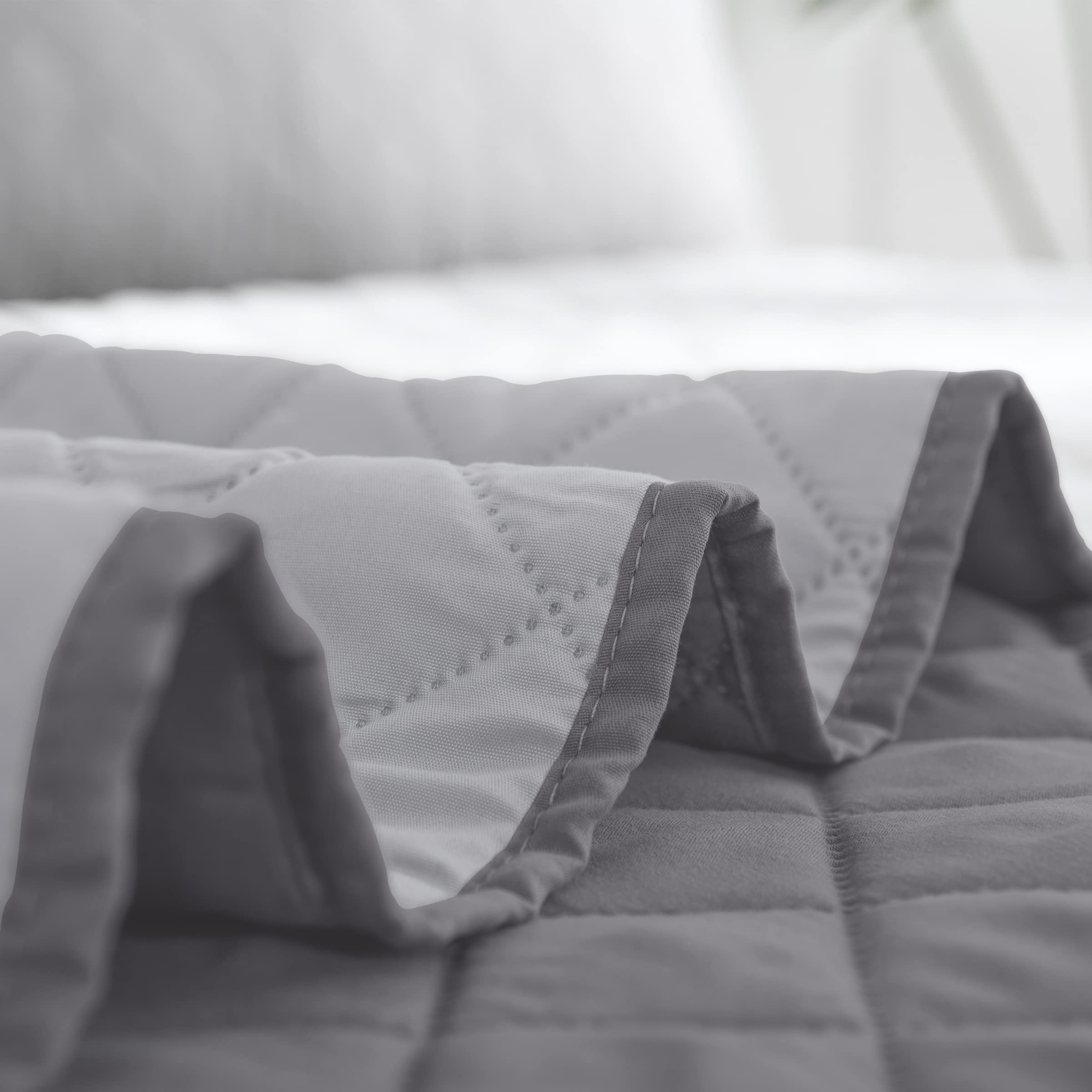 Easy-Going quilt styled on a bedroom bed offering a polished look and easy room refresh