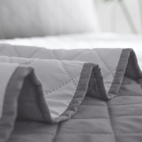 Easy-Going quilt styled on a bedroom bed offering a polished look and easy room refresh