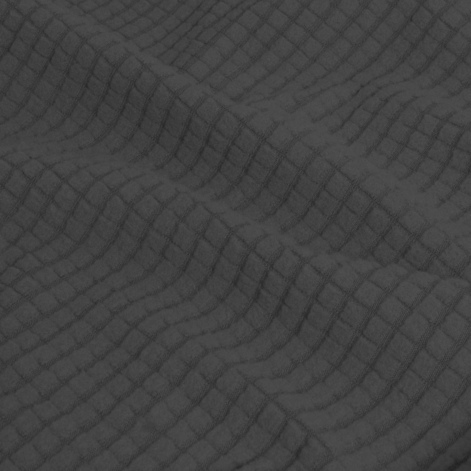 Easy-Going cover on sofa with measuring tape showing large size fit