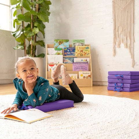 ECR4Kids wiping cushion surface to show water-resistant easy-clean benefit