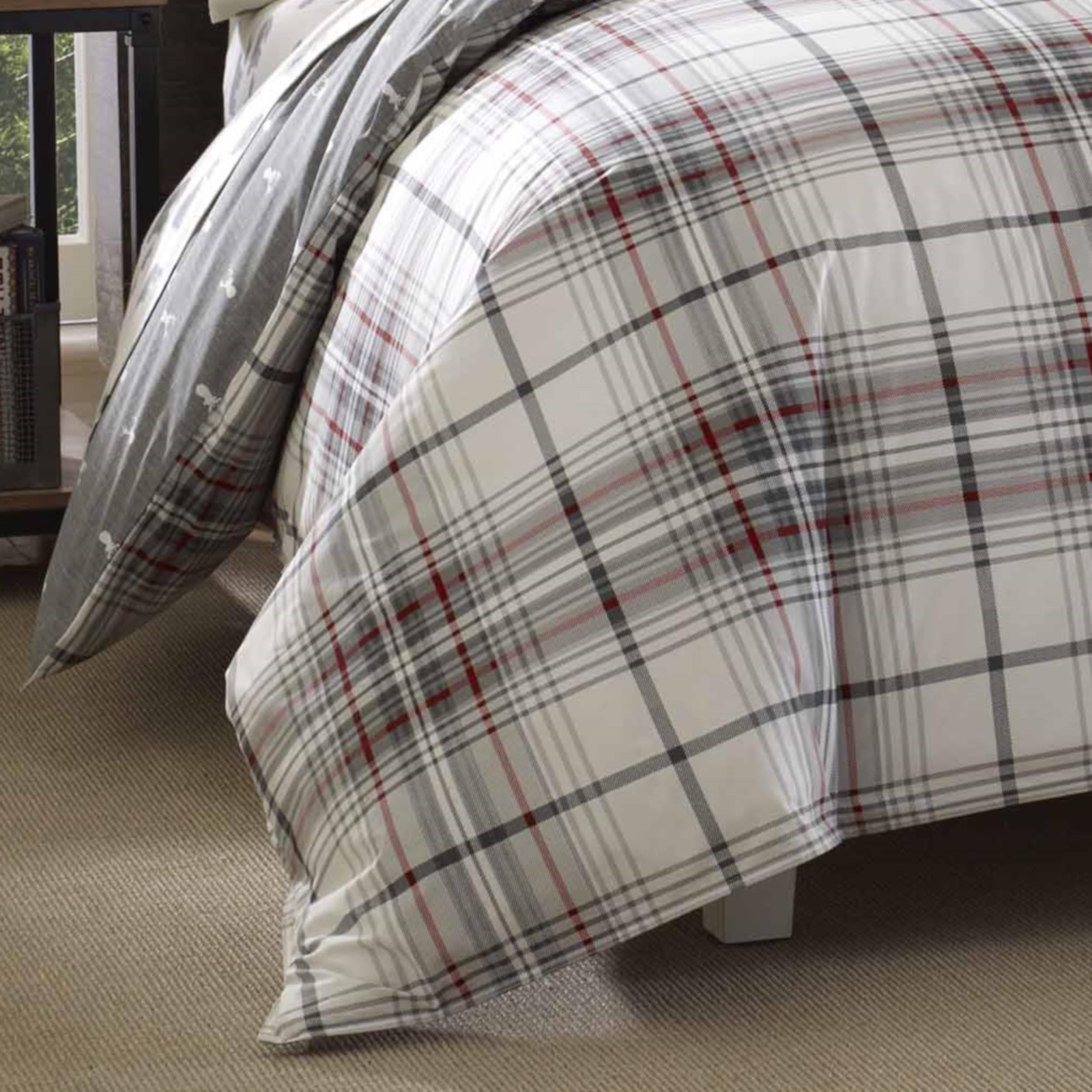 Eddie Bauer bed in cabin lifestyle illustrating cozy rustic ambience