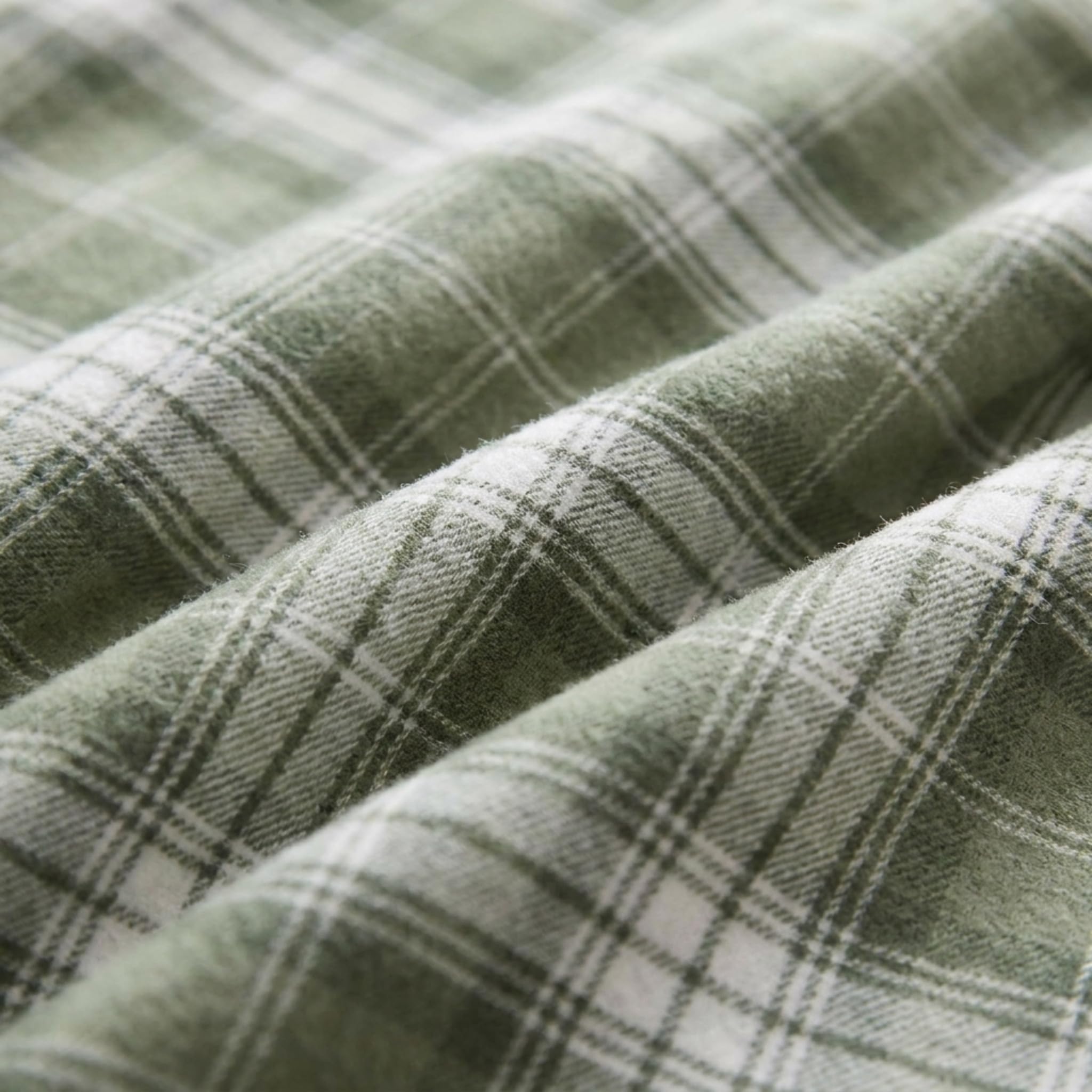 Eddie Bauer styled bedroom with sheets on bed showing cozy winter atmosphere